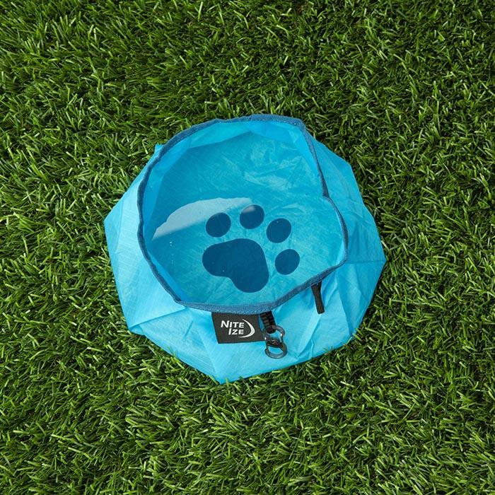 Blue Nite Ize RadDog Collapsible Bowl filled with water